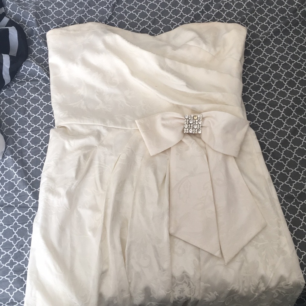 Adorable knee length white dress